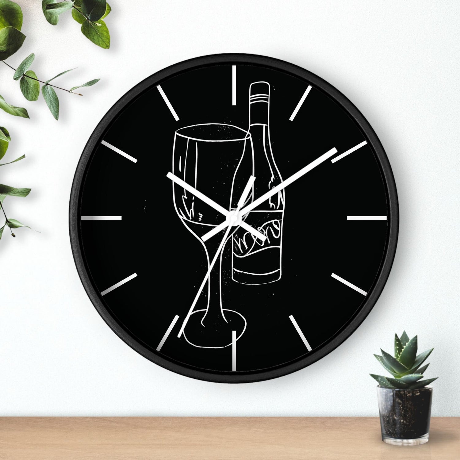 Clock in a wall with a digitally edited lino print black of a wine glass and bottle